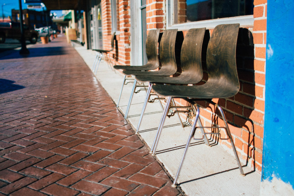 Sidewalk Vintage Chairs Brick Blue Laundromat